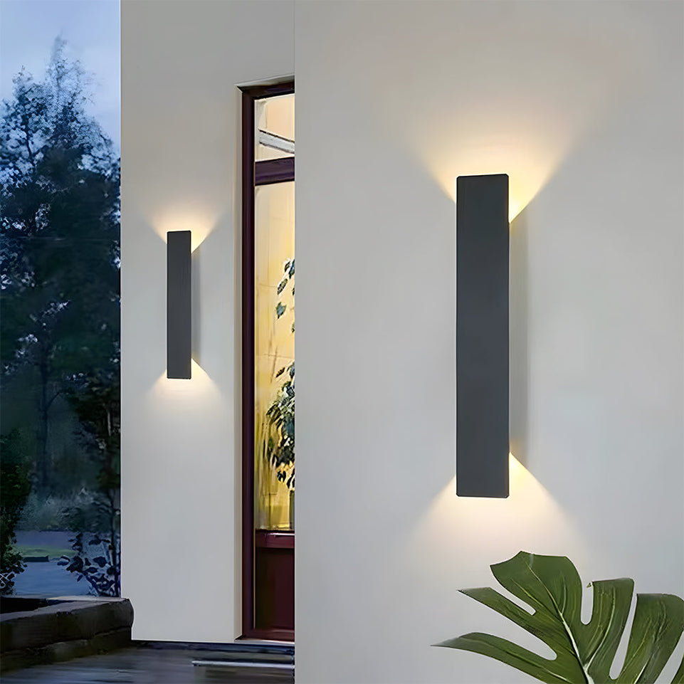 Modern outdoor wall lights on a white wall 