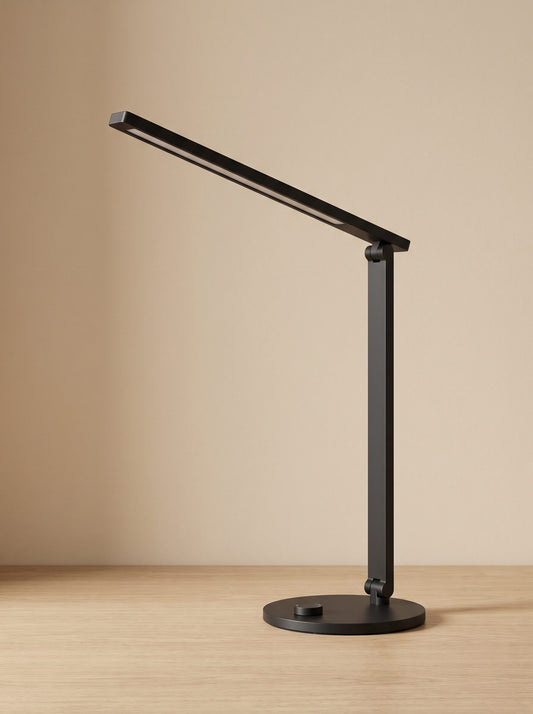 Flexo de escritorio LED negro mate con brazo articulado, vista frontal